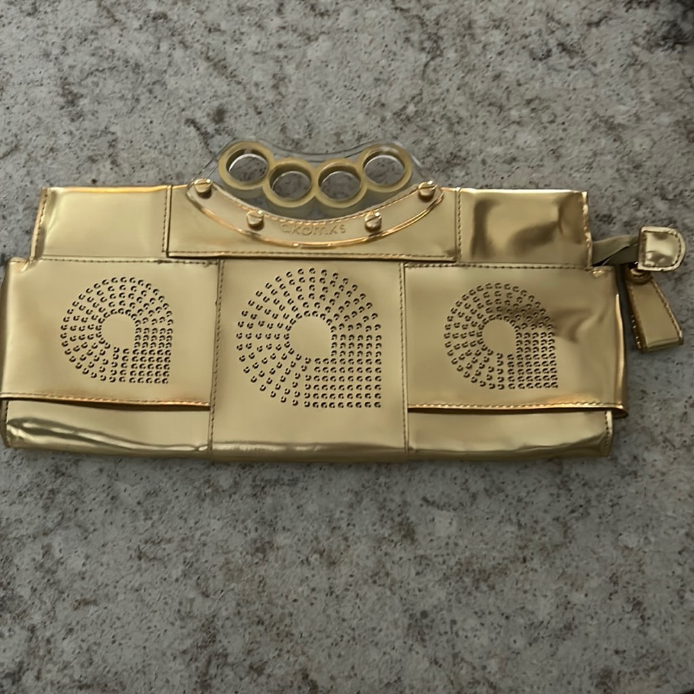 Akdmks gold clutch